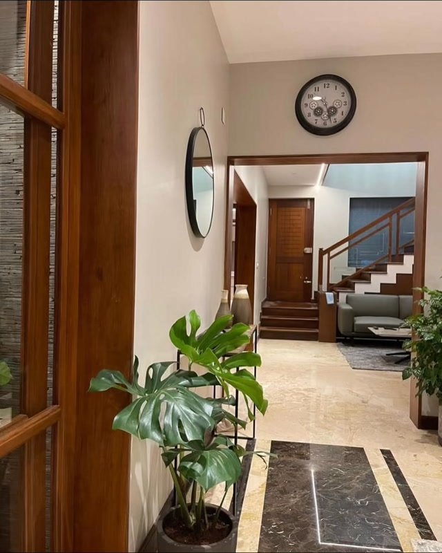 Heritage Burma teak foyer & living room crafted by Ken's Interiors